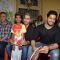 Varun Dhawan and Sidharth Malhotra pose with a kid at Ashray Ngo