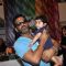 Suniel Shetty poses with a small kid at Araish Charity Exhibition