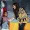 Sonam Kapoor greets a young fan at the Promotions of Khoobsurat in Delhi