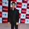 Karan Johar poses for the media at the Launch of 'Fame Fashion Network'