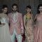 Models showcase the designs at the Store Launch of Shyamal Bhumika