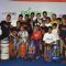Purab Kohli and Tara Sharma pose with the kids at Footsteps 4 Good Ngo Event
