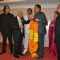 Shatrughan Sinha felicitated with a floral garland at the bash