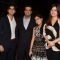 Simone Khan poses with her husband and children at her Store Launch