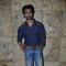 Nikhil Dwivedi poses for the media at the Special Screening of Tamanchey