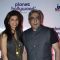 Zeba Kohli poses with her husband at the Launch of Planet Hollywood