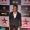 Tusshar Kapoor poses for the media at Star Box Office Awards