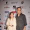 Vidhu Vinod Chopra poses with wife at the 16th MAMI Film Festival