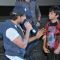 Hrithik Roshan interacts with a young fan at the Special Screening of Bang Bang