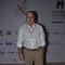 Anupam Kher poses for the media at the 16th MAMI Film Festival Day 3