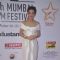 Tara Sharma poses for the media at the Closing Ceremony of 16th MAMI Film Festival