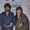 Pallavi Joshi poses with her husband at the Closing Ceremony of 16th MAMI Film Festival