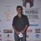 Rajat Kapoor poses for the media at the Closing Ceremony of 16th MAMI Film Festival
