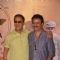 Rajkumar Hirani poses with Vidhu Vinod Chopra at the Teaser Trailer Launch of P.K.