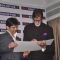 Amitabh Bachchan signs his autograph at the Launch of KKR's Box Office Website