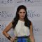 Nargis Fakhri poses for the media at 'Parachute Advanced Art of Oiling' Event