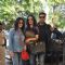 Karan Johar poses with friends at airport while leaving for Arpita Khan's Wedding