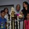 Aishwarya Rai Bachchan lights the lamp at Smile Train Organisation