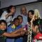 Aishwarya Rai Bachchan lights the lamp with children at Smile Train Organisation
