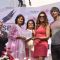 Bipasha Basu felicitates an achiever at the Launch of the 3rd Edition of Pinkathon