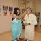 Amol Palekar's daughter feeds him cake at his Art Exhibition
