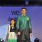 Karan Singh Grover walks the ramp with a small girl at Wellingkar's 26/11 Tribute