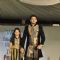 Shaad Randhawa walks the ramp with a small girl at Wellingkar's 26/11 Tribute