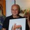 Anupam Kher poses with the potrait of Mother Teresa at the Inauguration of India Art Festival