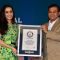 Shraddha Kapoor felicitates an official from Himalaya at Guinness Record Event