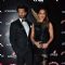 Bipasha Basu and Karan Singh Grover pose at Sansui Stardust Awards Red Carpet