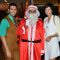 Sandip Soparkar and Jessy Randhawa pose with Santa Claus at their Christmas Bash