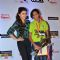 Soha Ali Khan poses with a winner at ITC Classmates Event