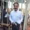 Baba Siddique poses for the media at Joe Rajan's Christmas Bash