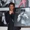 Shah Rukh Khan poses with his photo at Dabboo Ratnani's Calendar Launch