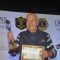 Prem Chopra poses with his award at Lion Gold Awards