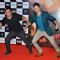 Varun Dhawan and Ahmed Khan strike a pose at the Music Launch of Badlapur