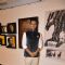 Randeep Hooda poses for the media at an Art Exhibition