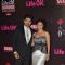 Gurmeet and Debina Choudhary pose for the media at 21st Annual Life OK Screen Awards Red Carpet