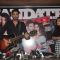 Daniel Weber plays a guitar at the Mandate Cover Launch