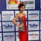 Sapna Pabbi poses  for the media at Mid Day Race