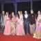 Family members pose for the media at the Wedding Reception of Kush Sinha