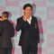 Shah Rukh Khan gives a flying kiss to the fans at the Launch of '& TV'