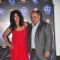 Ekta Kapoor poses with a guest at the Press Meet of Dolby Atmos