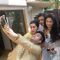 Bappa Lahiri clicks a selfie with friends at his Saraswati Pooja