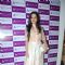 Amy Billimoria poses for the media at About Face Salon Launch