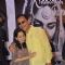 Vidhu Vinod Chopra was snapped hugging wife Anupama Chopra at the Book Launch