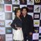 Rashmi Desai and Ankit Tiwari pose for the media at Radio Mirchi Awards