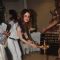 Suzanne Khan lights the lamp at the Inauguration of Exotic Bonsai Exhibition