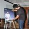 Arjun Kapoor signs his autograph at Earth Hour Press Meet