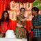 Kangana Ranaut feeds a piece of cake to R. Madhavan at the Poster Launch of Tanu Weds Manu Returns
